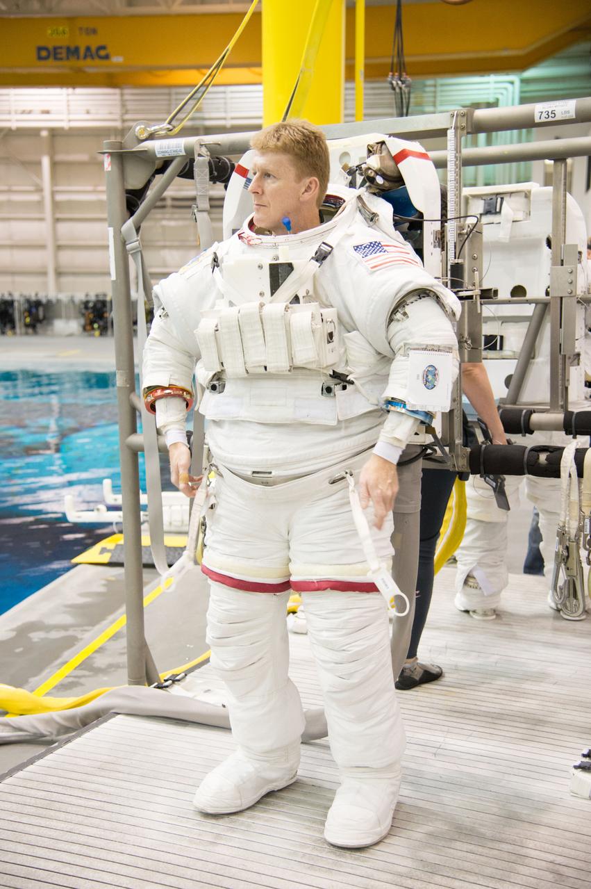 ESA astronaut and first astronaut from the United Kingdom, Timothy Peake, with NASA astronaut Scott Tingle (unassigned) during EVA Skills training in the NBL.  Photo Date: November 27, 2012.  Location: NBL - Pool Topside.  Photographer: Robert Markowitz