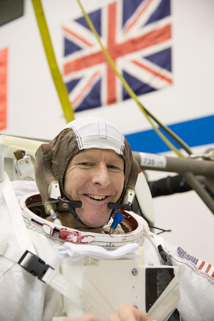 ESA astronaut and first astronaut from the United Kingdom, Timothy Peake, with NASA astronaut Scott Tingle (unassigned) during EVA Skills training in the NBL.  Photo Date: November 27, 2012.  Location: NBL - Pool Topside.  Photographer: Robert Markowitz