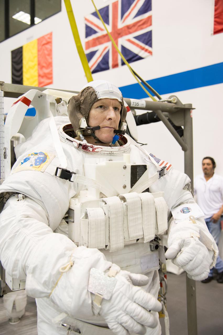 ESA astronaut and first astronaut from the United Kingdom, Timothy Peake, with NASA astronaut Scott Tingle (unassigned) during EVA Skills training in the NBL.  Photo Date: November 27, 2012.  Location: NBL - Pool Topside.  Photographer: Robert Markowitz