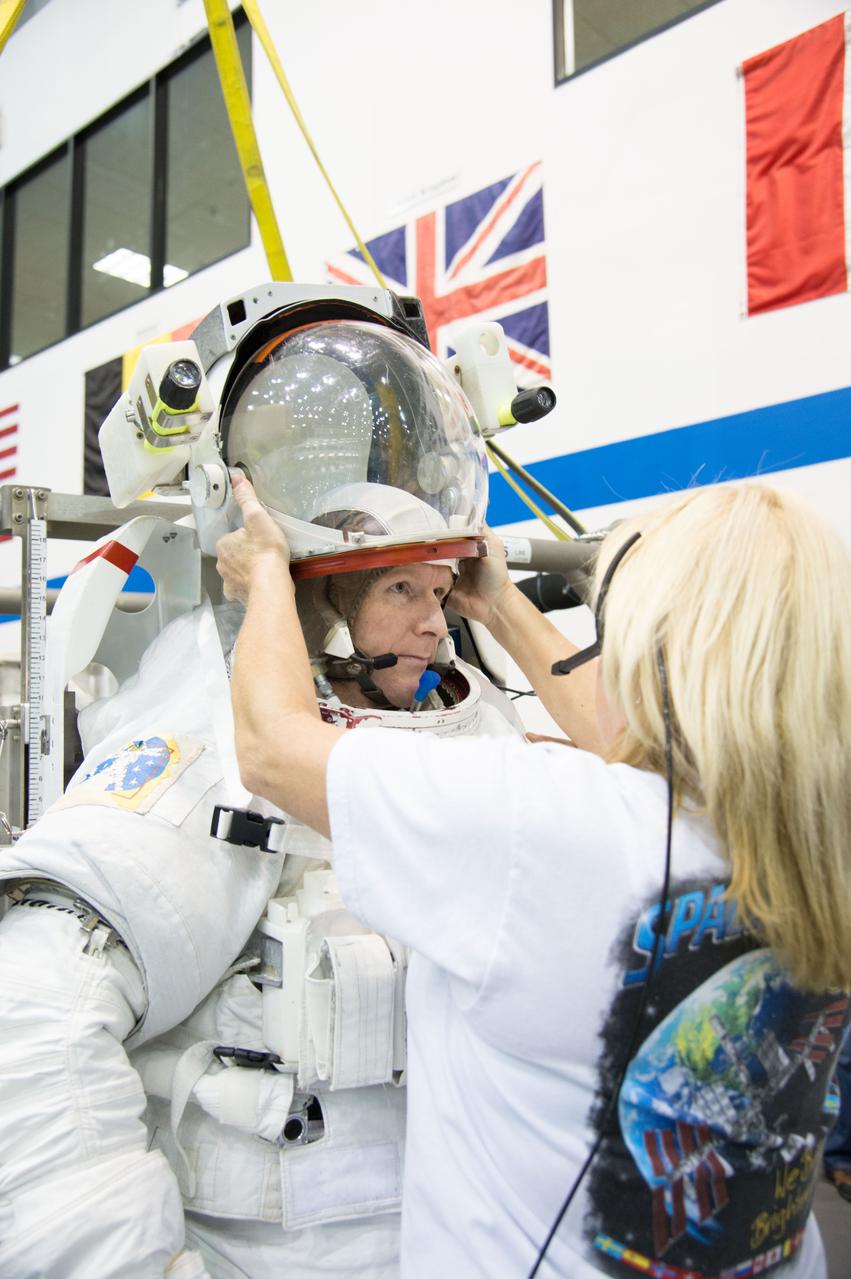 ESA astronaut and first astronaut from the United Kingdom, Timothy Peake, with NASA astronaut Scott Tingle (unassigned) during EVA Skills training in the NBL.  Photo Date: November 27, 2012.  Location: NBL - Pool Topside.  Photographer: Robert Markowitz