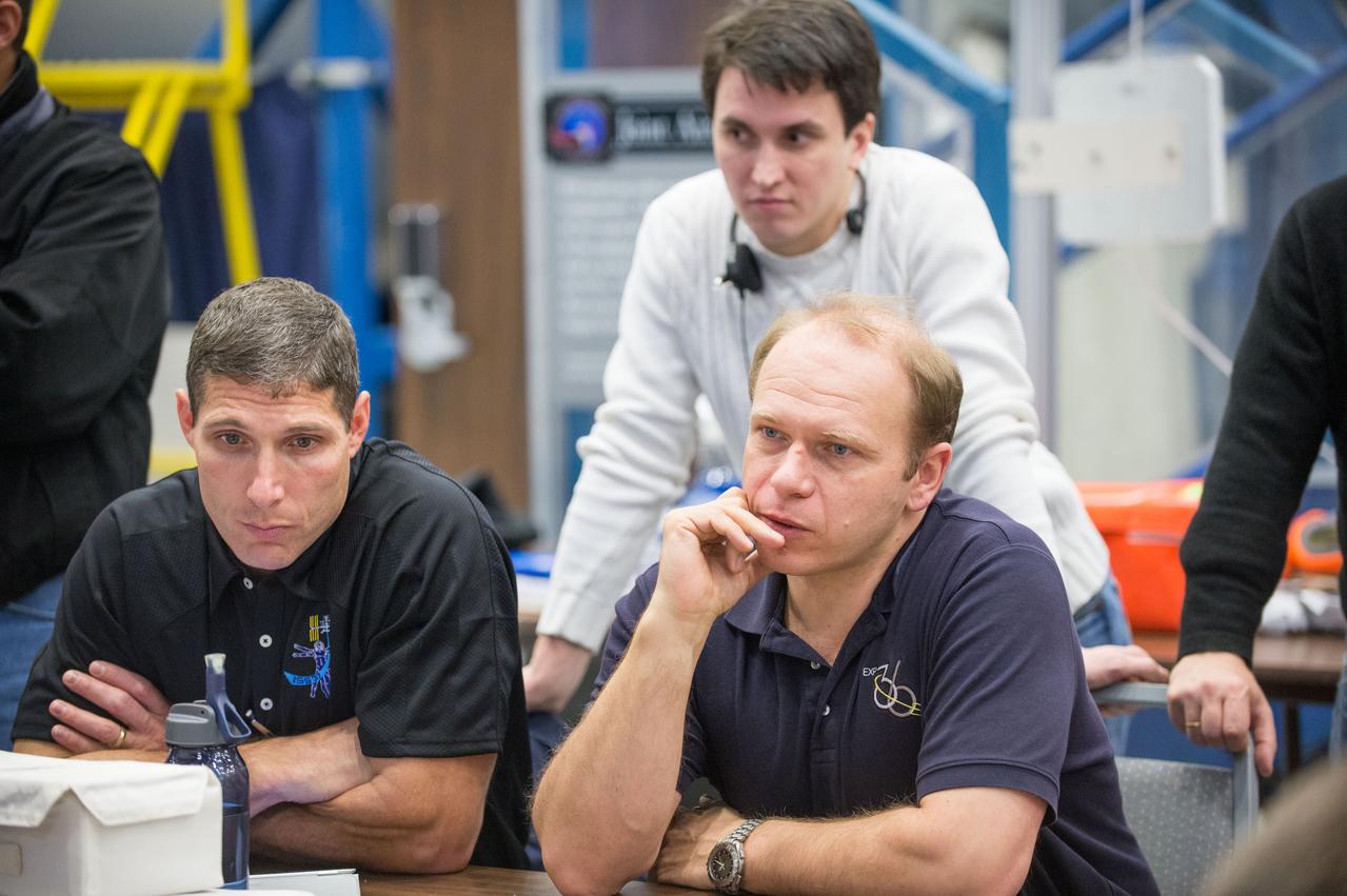 Expedition 36 & 37 crew members during Emergency Scene - 6 Crew training in ISS Mockups.  Photo Date: January 15, 2013.  Location: Building 9NW - ISS Mockups.  Photographer: Robert Markowitz