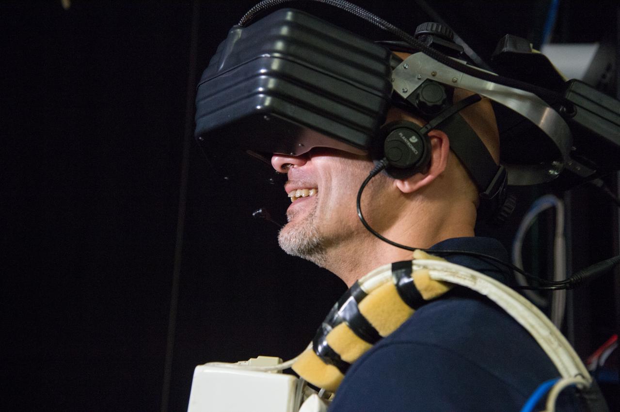 DATE: 1-22-13 LOCATION:  Bldg. 9 - VR Lab  SUBJECT: Expedition 36 crew Chris Cassidy, Karen Nyberg and Luca Parmitano during EVA robotics training in the VR Lab. PHOTOGRAPHER: Lauren Harnett