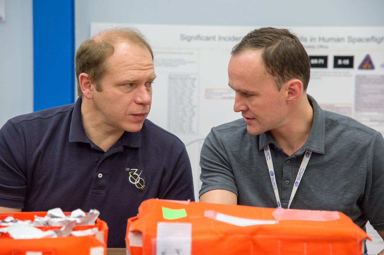 DATE: 1-24-13 LOCATION: Bldg. 9NW - ISS Mockups  SUBJECT: Expedition 38 crew members, Kotov, Ryazansky and Mike Hopkins during Emergency Scenarios Training in the ISS mockups.  PHOTOGRAPHER: Lauren Harnett