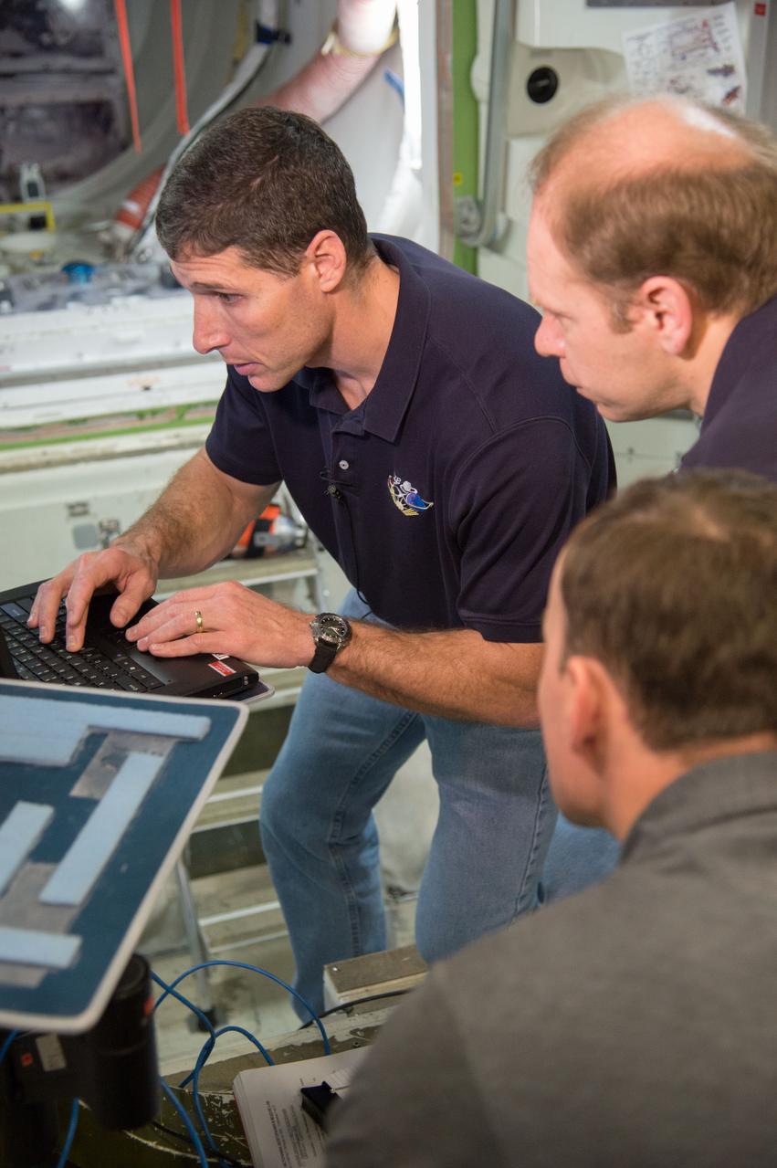 DATE: 1-24-13 LOCATION: Bldg. 9NW - ISS Mockups  SUBJECT: Expedition 38 crew members, Kotov, Ryazansky and Mike Hopkins during Emergency Scenarios Training in the ISS mockups.  PHOTOGRAPHER: Lauren Harnett