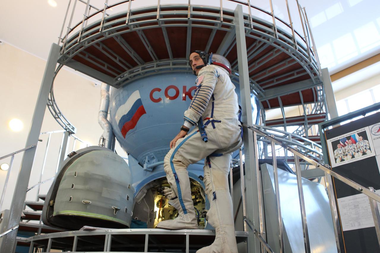 At the Gagarin Cosmonaut Training Center in Star City, Russia, Expedition 35-36 Flight Engineer Chris Cassidy enters a Soyuz spacecraft mockup March 5 for the  start of qualification simulation runs. Cassidy, Soyuz Commander Pavel Vinogradov and Flight Engineer Alexander Misurkin are training for launch March 29, Kazakh time, to the International Space Station in their Soyuz TMA-08M spacecraft from the Baikonur Cosmodrome in Kazakhstan. NASA / Stephanie Stoll