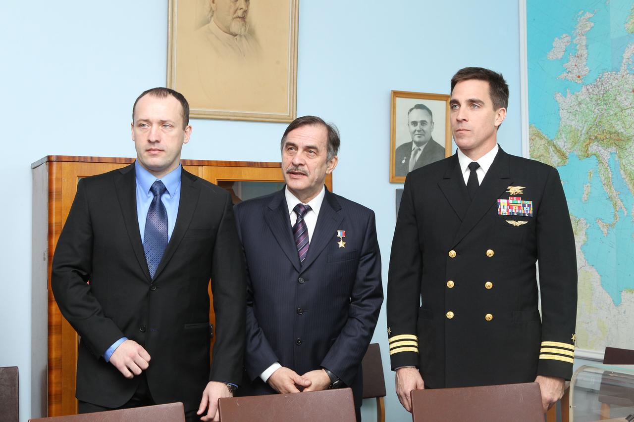With a picture of the Russian great designer Sergei Korolev over his right shoulder, Expedition 35-36 Flight Engineer Chris Cassidy (right) poses for pictures March 7 with his crewmates, Flight Engineer Alexander Misurkin (left) and Soyuz Commander Pavel Vinogradov (center) at the Gagarin Museum at the Gagarin Cosmonaut Training Center in Star City, Russia. The three crewmembers are training for their launch to the International Space Station March 29, Kazakh time, in their Soyuz TMA-08M spacecraft from the Baikonur Cosmodrome in Kazkahstan. NASA / Stephanie Stoll