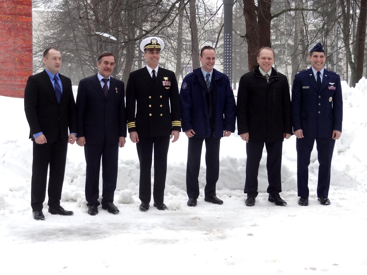 (16 March 2013) --- At the Gagarin Cosmonaut Training Center in Star City, Russia, the Expedition 35 prime and backup crew members pose for pictures March 16, 2013 before departing for their launch site at the Baikonur Cosmodrome in Kazakhstan for final training. From left to right are Flight Engineer Alexander Misurkin, Soyuz Commander Pavel Vinogradov, Flight Engineer Chris Cassidy of NASA, and backup crew members – cosmonauts Sergey Ryazanskiy and Oleg Kotov, and Michael Hopkins of NASA. Misurkin, Vinogradov and Cassidy are scheduled to launch from the Baikonur Cosmodrome on March 29, Kazakh time, on their Soyuz TMA-08M spacecraft to the International Space Station. Photo credit: NASA