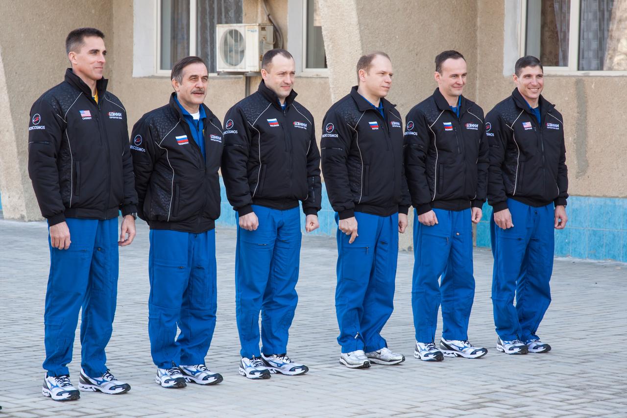 At their Cosmonaut Hotel crew quarters in Baikonur, Kazakhstan, the Expedition 35-36 prime and backup crewmembers pose for pictures March 18 following the traditional ceremony in which they raised the flags of Russia, the United States and Kazakhstan. From left to right are prime crewmembers Chris Cassidy of NASA, Pavel Vinogradov and Alexander Misurkin and backup crewmembers Oleg Kotov, Sergey Ryazanskiy and Michael Hopkins of NASA.  NASA/Victor Zelentsov 