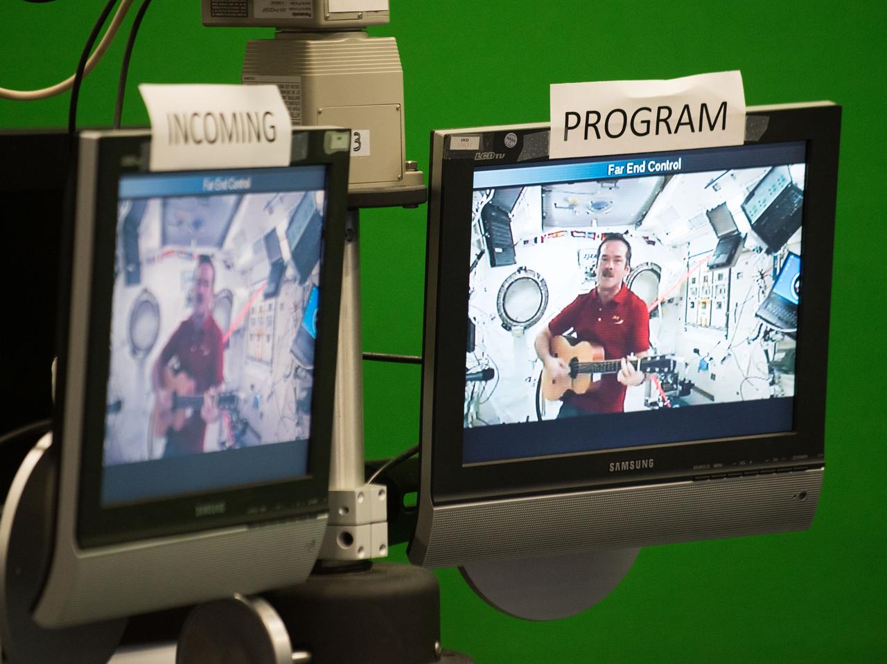 jsc2013e020096 (3/27/2013) --- JSCs Digital Learning Network hosts a live International Space Station (ISS) downlink with students from the Pasadena Independent School Districts Pearl Hall Elementary as they explore the many cultures and music surrounding the ISS partners. The Music and Space event is hosted by Astronaut Cady Coleman. Students perform songs at the JSC DLN studio with Astronauts Coleman and Dan Burbank who perform with flute and guitar.