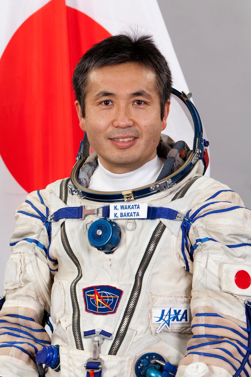 JSC2013-E-026356 (April 2013) --- Expedition 36 backup crew member Koichi Wakata of the Japan Aerospace Exploration Agency (JAXA) poses for a portrait in his Russian Sokol launch and entry suit. Photo credit: Gagarin Cosmonaut Training Center