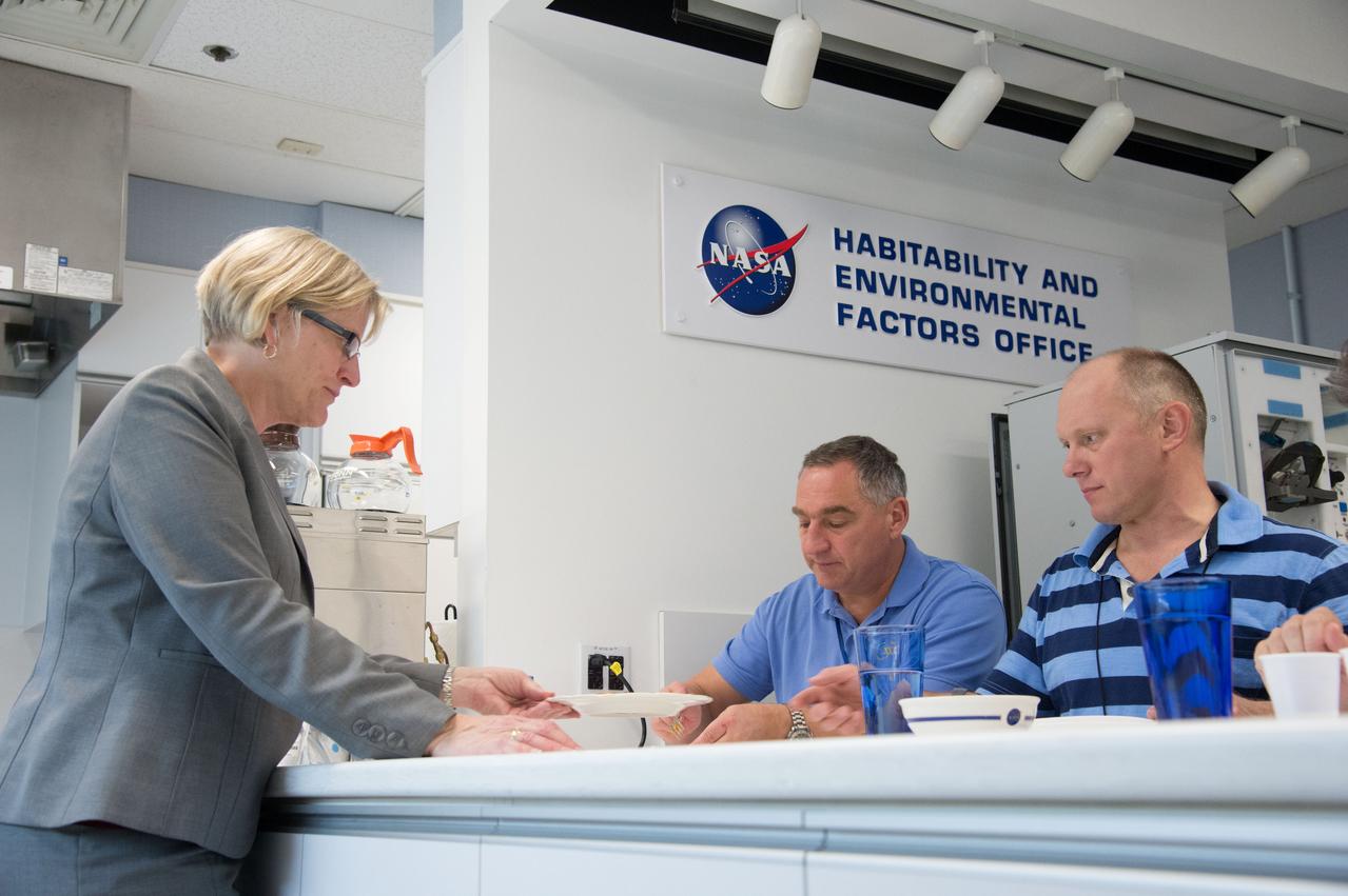 PHOTO DATE:  04-26-13 LOCATION: Bldg. 17, Rm 1070 - Food Lab   SUBJECT: Soyuz 38 (Expedition 39/40) crew members Alexander Skvortov and Oleg Artemiev during food tasting in JSC Food Lab. Photograph cosmonauts individually, with food lab personnel, together, etc. PHOTOGRAPHER: BILL STAFFORD