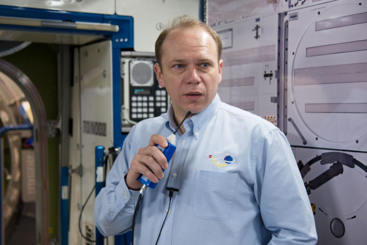 PHOTO DATE: 5-3-13 LOCATION: Bldg. 9NW - ISS Mockups SUBJECT: Soyuz 36 crew (Oleg Kotov, Sergey Ryazanskiy and Michael Hopkins) in their Routine Ops training. PHOTOGRAPHER: Lauren Harnett