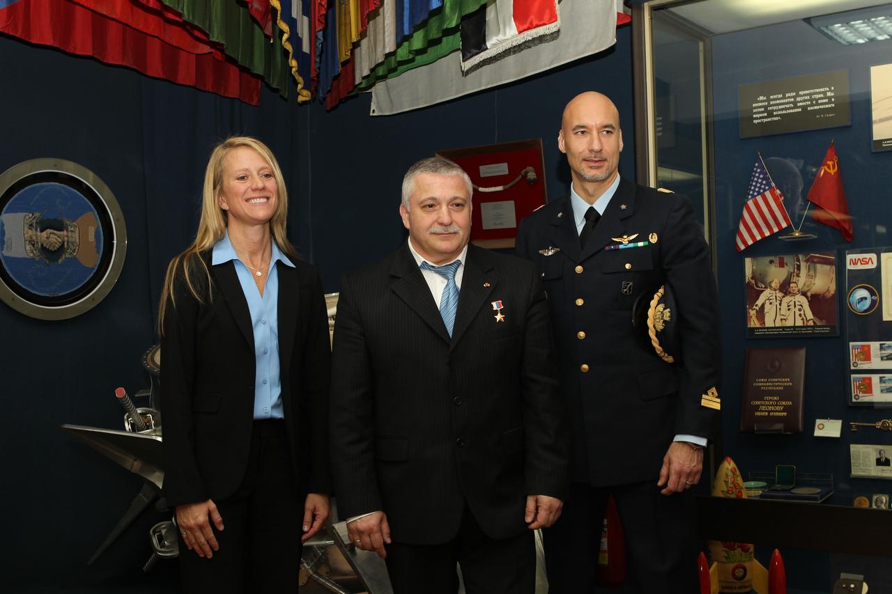 At the Gagarin Cosmonaut Training Center in Star City, Russia, Expedition 36/37 Flight Engineer Karen Nyberg (left), Soyuz Commander Fyodor Yurchikhin (center) and Flight Engineer Luca Parmitano of the European Space Agency (right) pose for pictures at the Cosmonautics Museum May 8 as part of their pre-launch activities. Nyberg, Yurchikhin and Parmitano are preparing for their launch May 29, Kazakh time, in their Soyuz TMA-09M spacecraft from the Baikonur Cosmodrome in Kazakhstan for a six-month mission on the International Space Station. NASA/Stephanie Stoll
