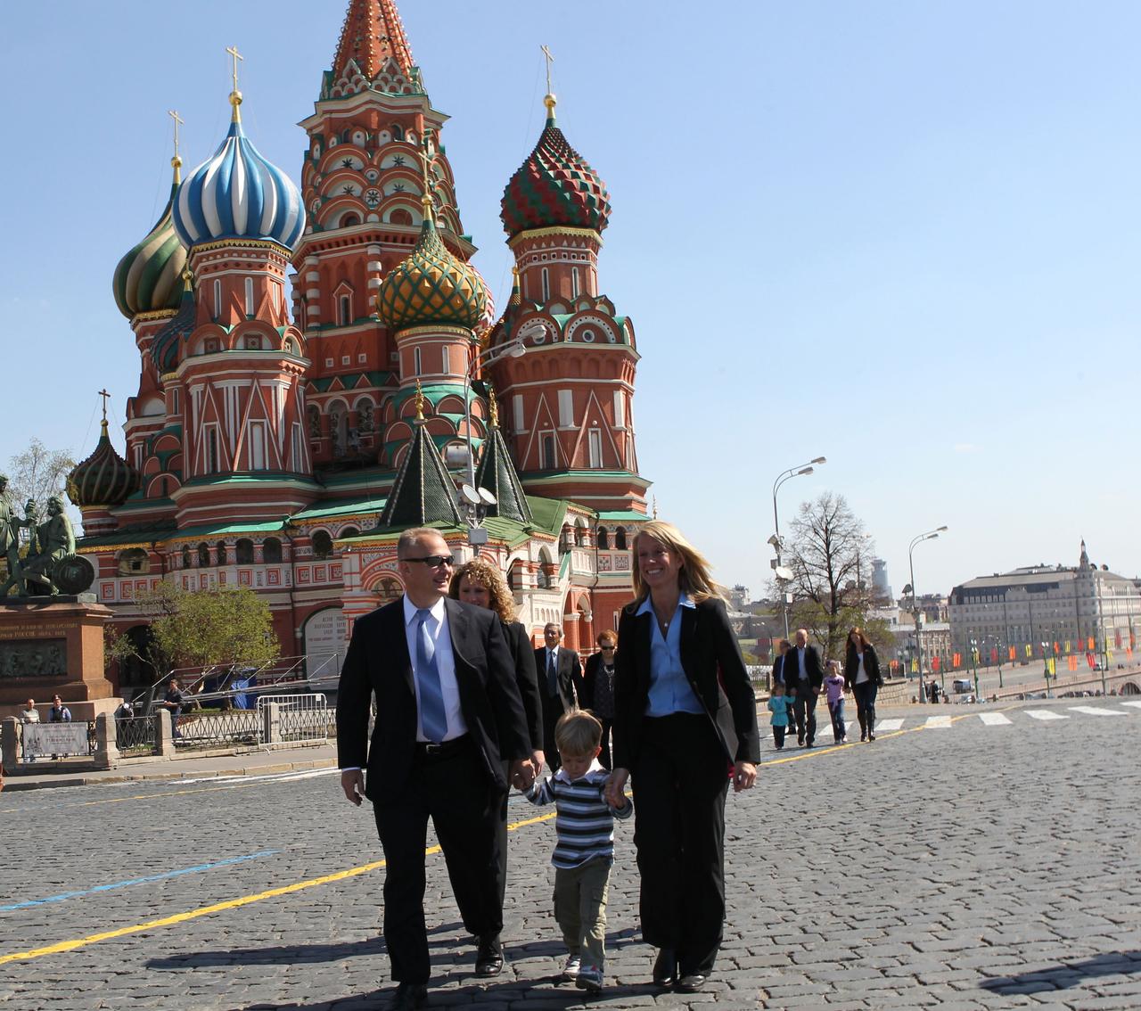 Expedition 36/37 Flight Engineer Karen Nyberg (right) takes a stroll through Red Square in Moscow in front of St. Basil’s Cathedral May 8 with her husband, astronaut Doug Hurley (left) and their son, Soyuz Commander Fyodor Yurchikhin and Flight Engineer Luca Parmitano of the European Space Agency are preparing for their launch May 29, Kazakh time, in their Soyuz TMA-09M spacecraft from the Baikonur Cosmodrome in Kazakhstan for a six-month mission on the International Space Station. NASA/Stephanie Stoll
