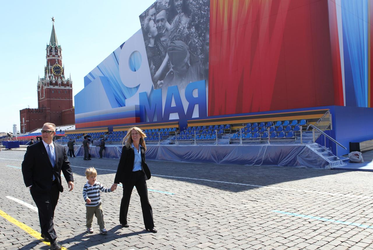 Expedition 36/37 Flight Engineer Karen Nyberg (right) takes a stroll through Red Square in Moscow in front of a grandstand and the Kremlin May 8 with her husband, astronaut Doug Hurley (left) and their son. Red Square was decorated for commemorative activity in honor of Russian Victor Day May 9. Nyberg, Soyuz Commander Fyodor Yurchikhin and Flight Engineer Luca Parmitano of the European Space Agency are preparing for their launch May 29, Kazakh time, in their Soyuz TMA-09M spacecraft from the Baikonur Cosmodrome in Kazakhstan for a six-month mission on the International Space Station. NASA/Stephanie Stoll