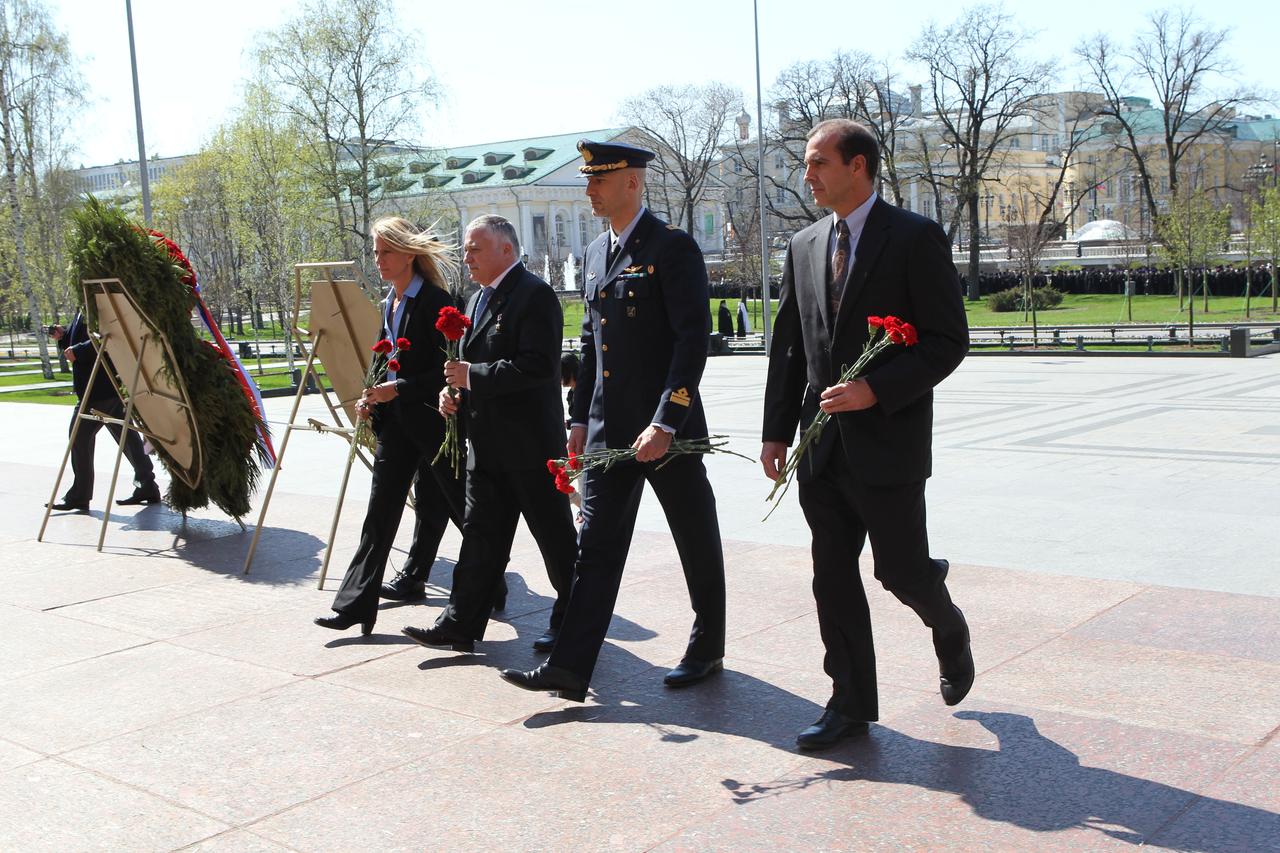 Expedition 36/37 prime and backup crewmembers approach the Tomb of the Unknown Soldier at Red Square in Moscow May 8 to lay flowers in honor of Russian Victory Day May 9. From left to right are prime Flight Engineer Karen Nyberg of NASA, prime Soyuz Commander Fyodor Yurchikhin, prime Flight Engineer Luca Parmitano of the European Space Agency and backup Flight Engineer Rick Mastracchio of NASA. Nyberg, Yurchikhin and Parmitano are preparing for their launch May 29, Kazakh time, in their Soyuz TMA-09M spacecraft from the Baikonur Cosmodrome in Kazakhstan for a six-month mission on the International Space Station. NASA/Stephanie Stoll