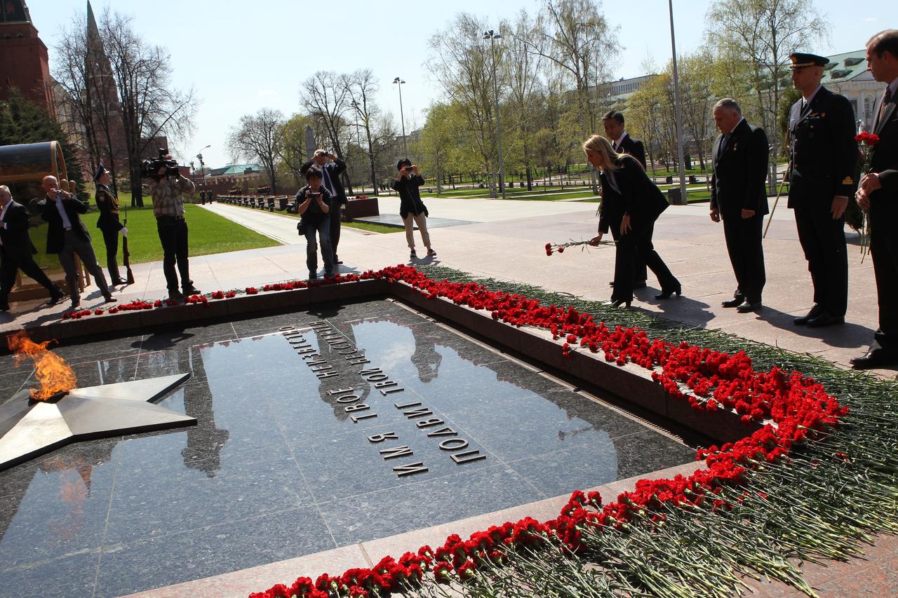 Expedition 36/37 Flight Engineer Karen Nyberg of NASA lays a flower at the Tomb of the Unknown Soldier at Red Square in Moscow May 8 in honor of Russian Victory Day May 9. Behind Nyberg from left to right are backup crewmember Koichi Wakata of the Japan Aerospace Exploration Agency, prime Soyuz Commander Fyodor Yurchikhin, prime Flight Engineer Luca Parmitano of the European Space Agency and backup crewmember Rick Mastracchio of NASA.  Nyberg, Yurchikhin and Parmitano are preparing for their launch May 29, Kazakh time, in their Soyuz TMA-09M spacecraft from the Baikonur Cosmodrome in Kazakhstan for a six-month mission on the International Space Station. NASA/Stephanie Stoll