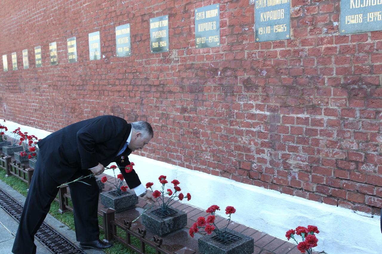 Expedition 36/37 Soyuz Commander Fyodor Yurchikhin lays flowers at the Kremlin Wall at Red Square in Moscow May 8 in a traditional ceremony honoring the spot where Russian space icons are interred. Yurchikhin, Flight Engineer Karen Nyberg of NASA and Flight Engineer Luca Parmitano of the European Space Agency are preparing for launch May 29, Kazakh time, in their Soyuz TMA-09M spacecraft from the Baikonur Cosmodrome in Kazakhstan for a six-month mission on the International Space Station. NASA/Stephanie Stoll