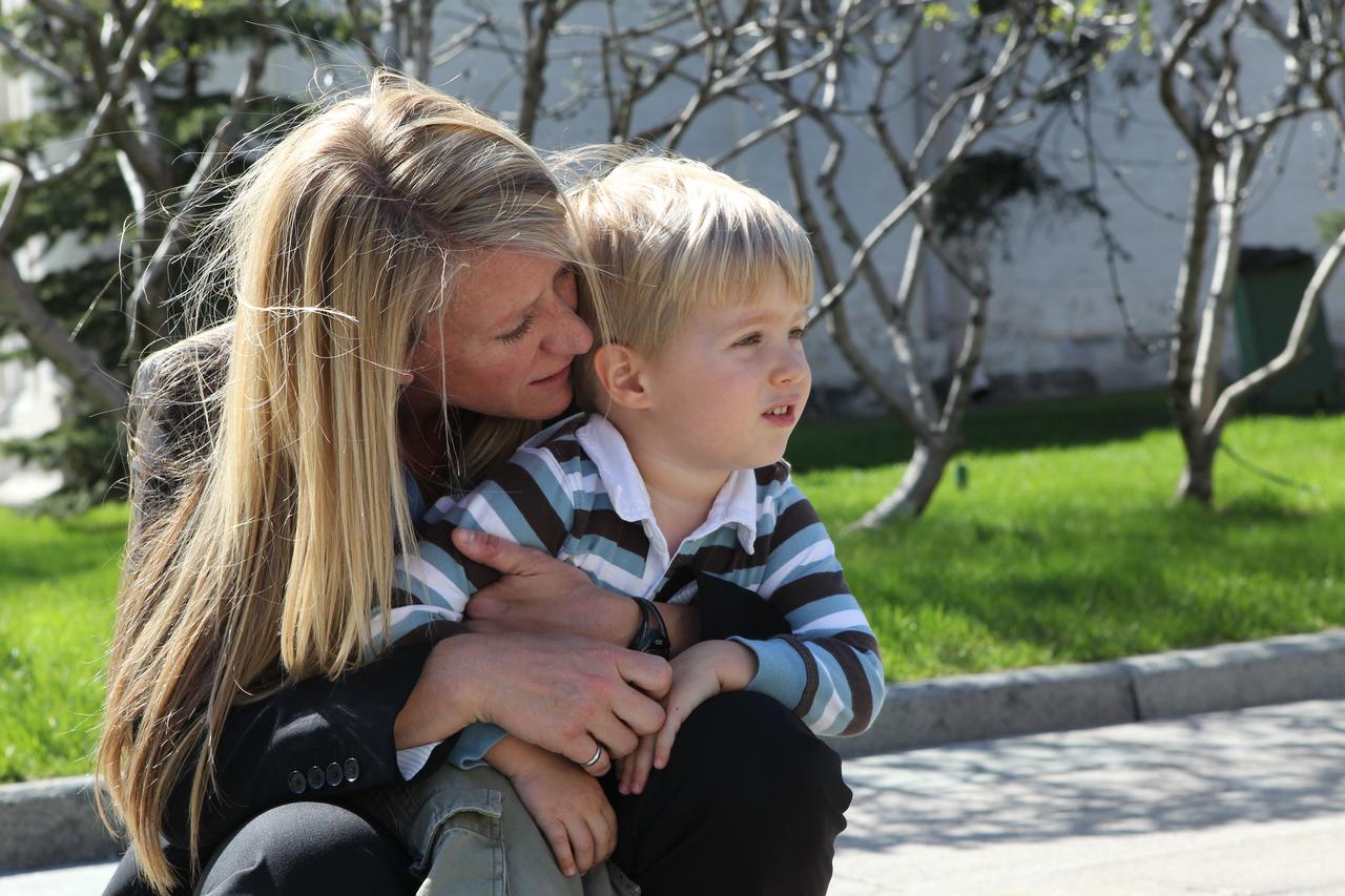 Expedition 36/37 Flight Engineer Karen Nyberg of NASA shares a quiet moment with her son during a tour of the Kremlin and Red Square in Moscow May 8. Nyberg, Soyuz Commander Fyodor Yurchikhin and European Space Agency Flight Engineer Luca Parmitano of the European Space Agency are preparing for their launch May 29, Kazakh time, in their Soyuz TMA-09M spacecraft from the Baikonur Cosmodrome in Kazakhstan for a six-month mission on the International Space Station. NASA/Stephanie Stoll