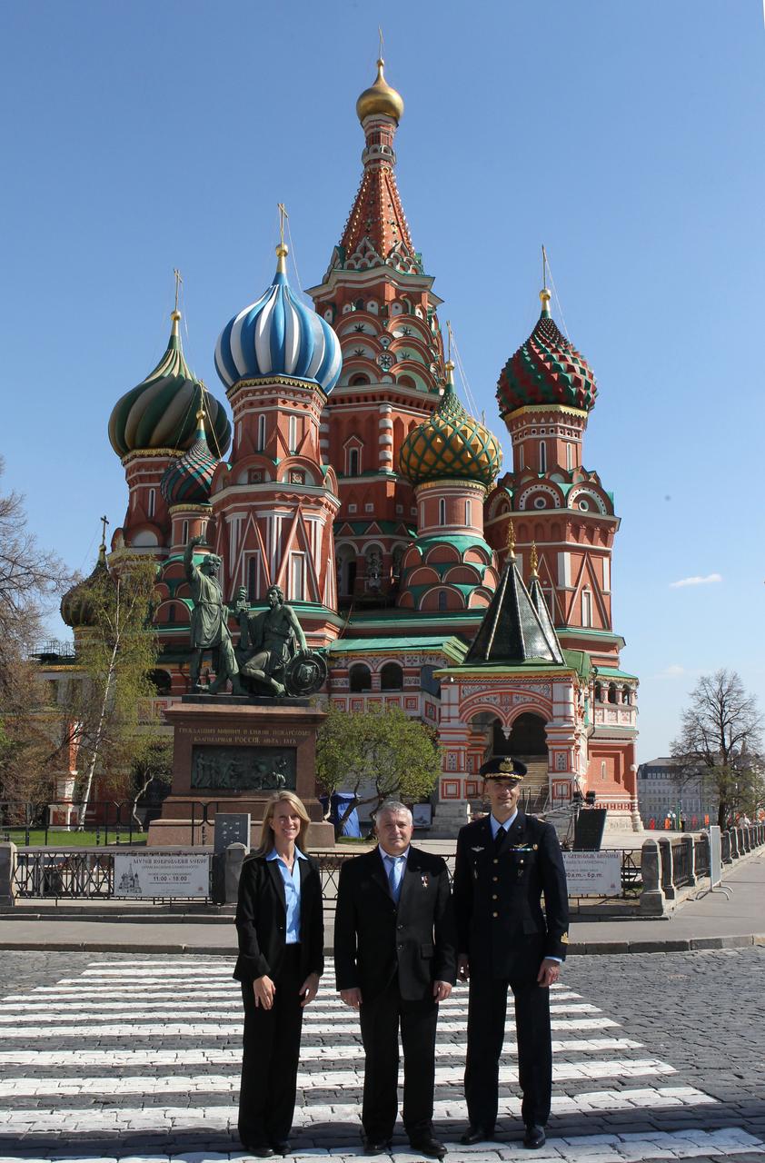 With famed St. Basil’s Cathedral serving as a backdrop, Expedition 36/37 Flight Engineer Karen Nyberg of NASA (left), Soyuz Commander Fyodor Yurchikhin (center) and Flight Engineer Luca Parmitano of the European Space Agency (right) pose for pictures May 8 during a ceremonial tour of Red Square in Moscow. Nyberg, Yurchikhin and Parmitano are preparing for their launch May 29, Kazakh time, in their Soyuz TMA-09M spacecraft from the Baikonur Cosmodrome in Kazakhstan for a six-month mission on the International Space Station. NASA/Stephanie Stoll