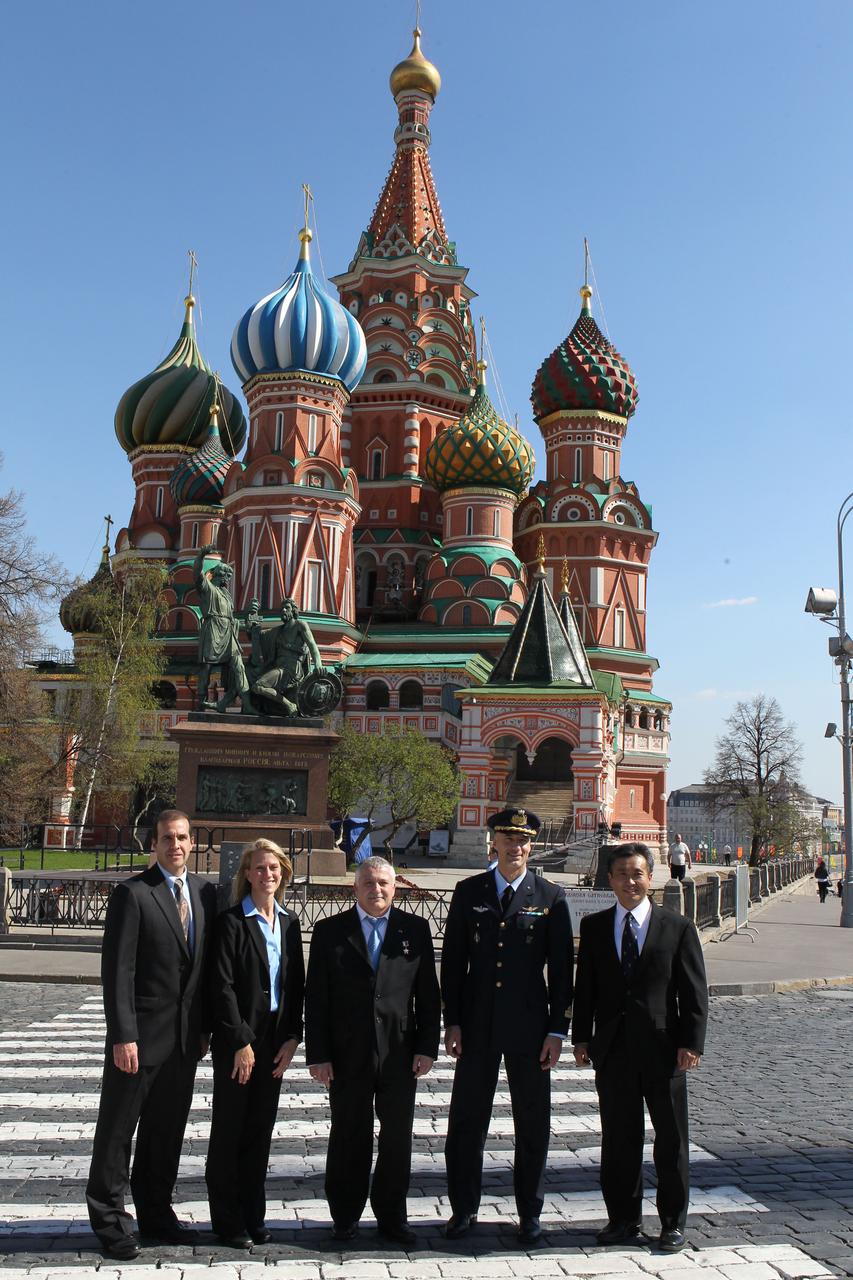 With famed St. Basil’s Cathedral serving as a backdrop, Expedition 36/37 prime and backup crewmembers pose for pictures May 8 during a ceremonial tour of Red Square in Moscow. From left to right are backup crewmember Rick Mastracchio of NASA, prime Flight Engineer Karen Nyberg of NASA, prime Soyuz Commander Fyodor Yurchikhin, prime Flight Engineer Luca Parmitano of the European Space Agency and backup crewmember Koichi Wakata of the Japan Aerospace Exploration Agency. Nyberg, Yurchikhin and Parmitano are preparing for their launch May 29, Kazakh time, in their Soyuz TMA-09M spacecraft from the Baikonur Cosmodrome in Kazakhstan for a six-month mission on the International Space Station. NASA/Stephanie Stoll