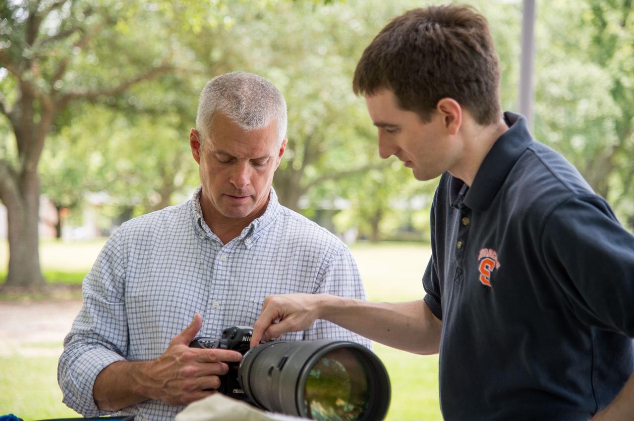 PHOTO DATE:   05-20-13 LOCATION: Bldg. 4south, Room  1303   SUBJECT: Soyuz 38 (Expedition 39/40) crew member Steve Swanson training on Nikon camera equipment and long lenses for External Photo Skills with instructor Paul Reichert. PHOTOGRAPHER: BILL STAFFORD