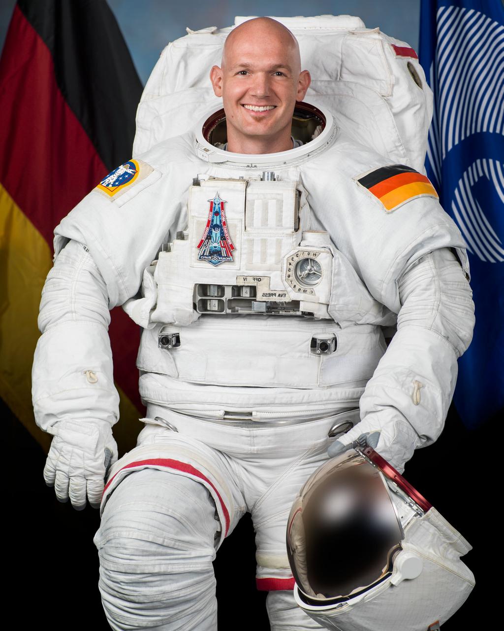 JSC2013-E-059969 (3 June 2013) --- Official portrait of European Space Agency astronaut Alexander Gerst in an Extravehicular Mobility Unit (EMU) spacesuit. Photo credit: NASA
