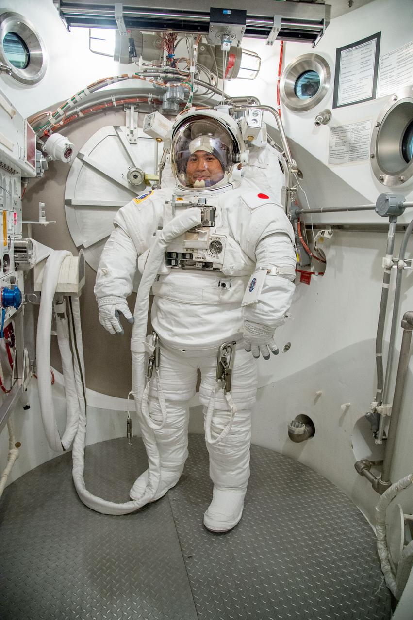 PHOTO DATE: 20 June 2013 LOCATION: Bldg. 7, SSATA Chamber SUBJECT: JAXA Astronaut Koichi Wakata during SSATA Dry Run. PHOTOGRAPHER: Mark Sowa