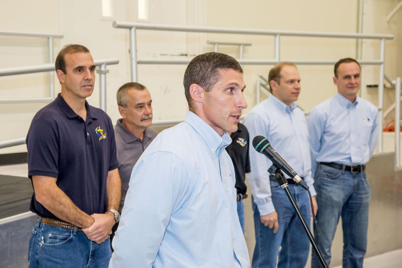 Date: 07-03-13 Location: Bldg 5, SSTF High Bay Subject: Expedition 38 (Soyuz 36 & 37) crew members during cake ceremony marking the end of their training. Photographer: James Blair