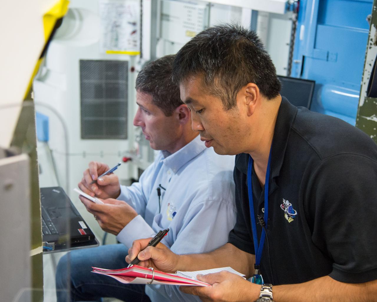 DATE: 7-3-13 LOCATION: Bldg 9NW - ISS Mockups. SUBJECT: Expedition 36S crew members, Kotov, Ryazansky and Hopkins and 37S crew (Wakata, Tyurin, Mastracchio) during Emergency Scenarios Training. PHOTOGRAPHER: Lauren Harnett