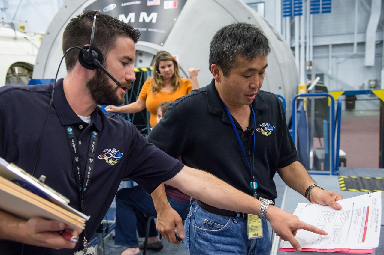 DATE: 7-3-13 LOCATION: Bldg 9NW - ISS Mockups. SUBJECT: Expedition 36S crew members, Kotov, Ryazansky and Hopkins and 37S crew (Wakata, Tyurin, Mastracchio) during Emergency Scenarios Training. PHOTOGRAPHER: Lauren Harnett