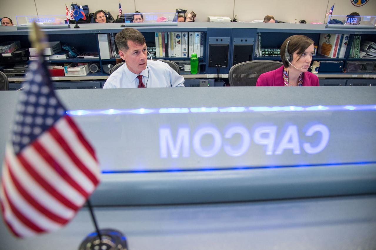 PHOTO DATE: 07-09-13 LOCATION: Bldg. 30 - FCR-1, ISS MER & B-7 SUBJECT: Expedition 36 ISS flight controllers on console during EVA #22 with Chris Cassidy and Luca Parmitano. PHOTOGRAPHER: BILL STAFFORD