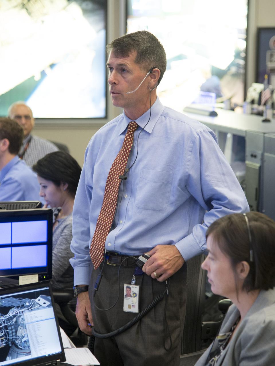 Date: 07-16-13 Location: Bldg 30 South, FCR-1 Subject:  Expedition 36 ISS flight controllers on console during EVA #23 with Chris Cassidy and Luca Parmitano. Photographer: James Blair