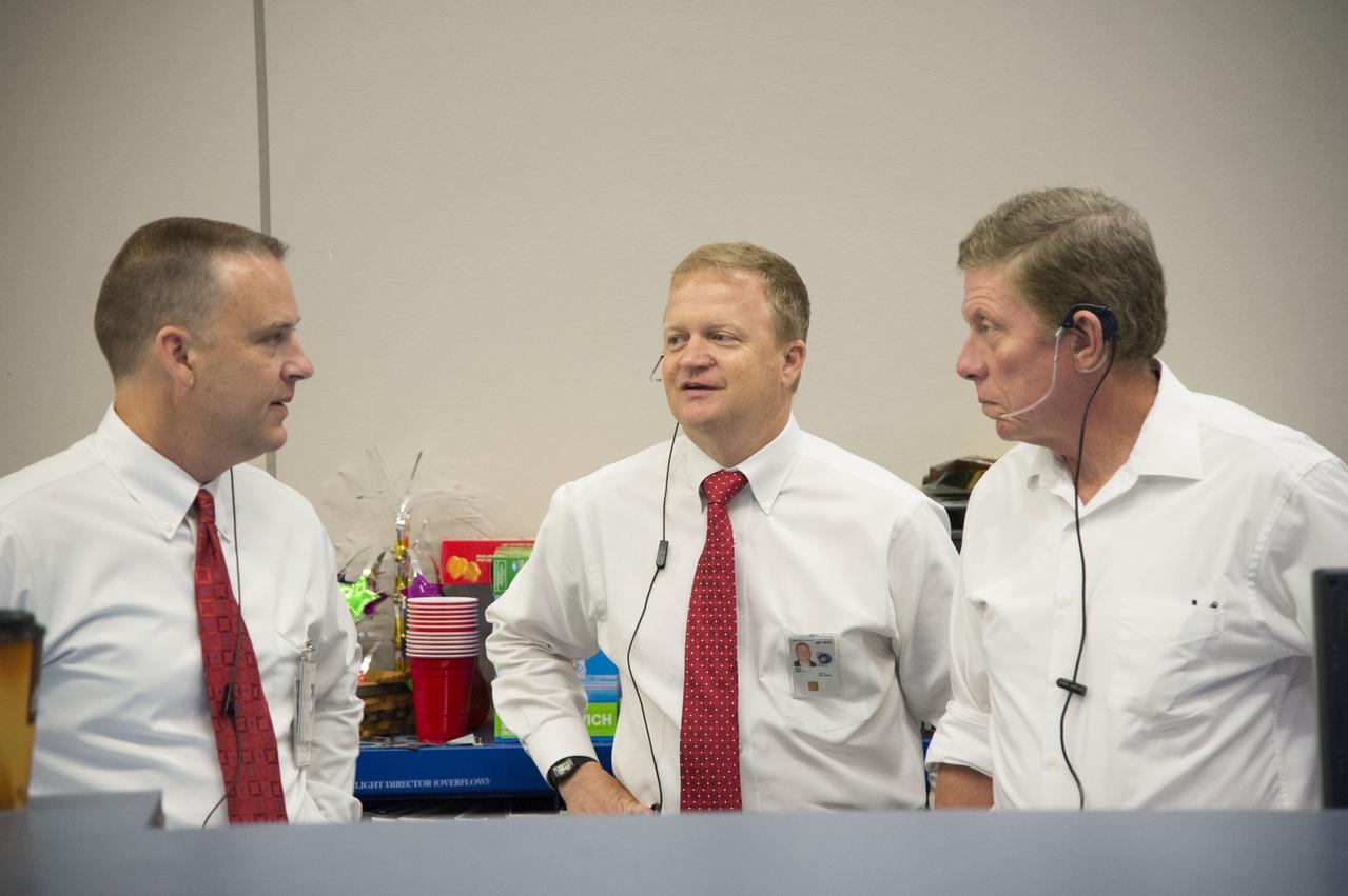 Date: 07-16-13 Location: Bldg 30 South, FCR-1 Subject: Expedition 36 ISS flight controllers on console during EVA #23 with Chris Cassidy and Luca Parmitano. Photographer: James Blair