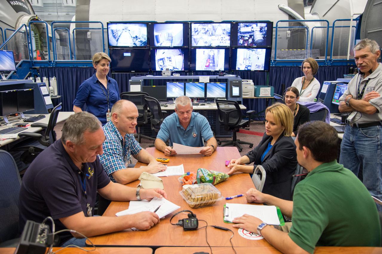 PHOTO DATE:  07-18-13 LOCATION:  Bldg. 9NW - ISS Mockups  SUBJECT: Expedition 38 crew's Emergency Scenarios Training in SVMTF's ISS Mockups. PHOTOGRAPHER: BILL STAFFORD