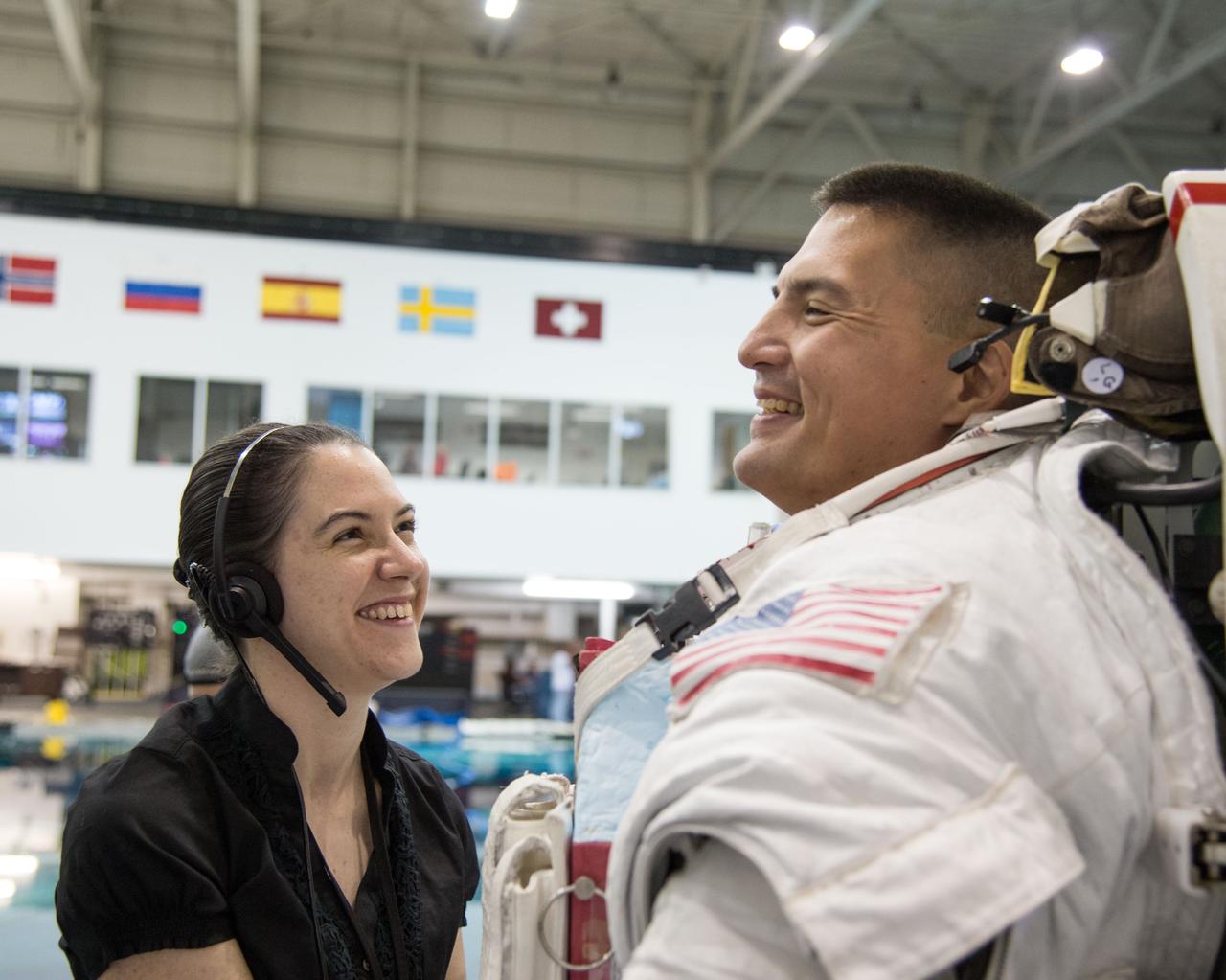 PHOTO DATE:  08-08-13 LOCATION:  NBL - Pool Topside SUBJECT: Expedition 44 crew members Kjell Lindren and Kimiya Yui (JAXA) during INC-44 ISS EVA Maintence PHOTOGRAPHER: BILL STAFFORD