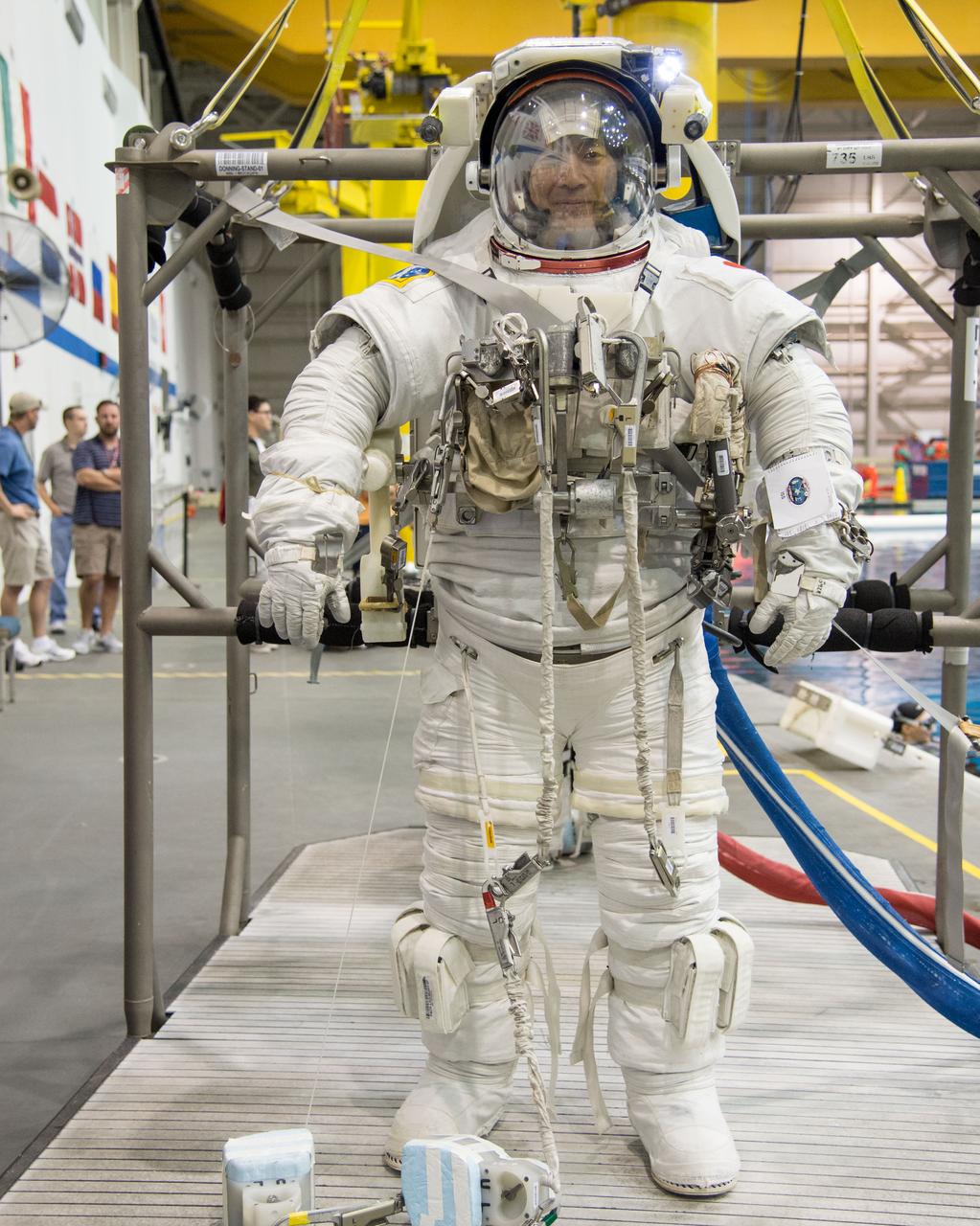 PHOTO DATE:  08-08-13 LOCATION:  NBL - Pool Topside SUBJECT: Expedition 44 crew members Kjell Lindren and Kimiya Yui (JAXA) during INC-44 ISS EVA Maintence PHOTOGRAPHER: BILL STAFFORD