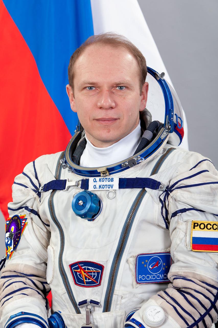 JSC2013-E-075998 (20 Feb. 2013) --- Russian cosmonaut Oleg Kotov, Expedition 37 flight engineer and Expedition 38 commander, attired in a Russian Sokol launch and entry suit, takes a break from training in Star City, Russia to pose for a portrait. Photo credit: Gagarin Cosmonaut Training Center