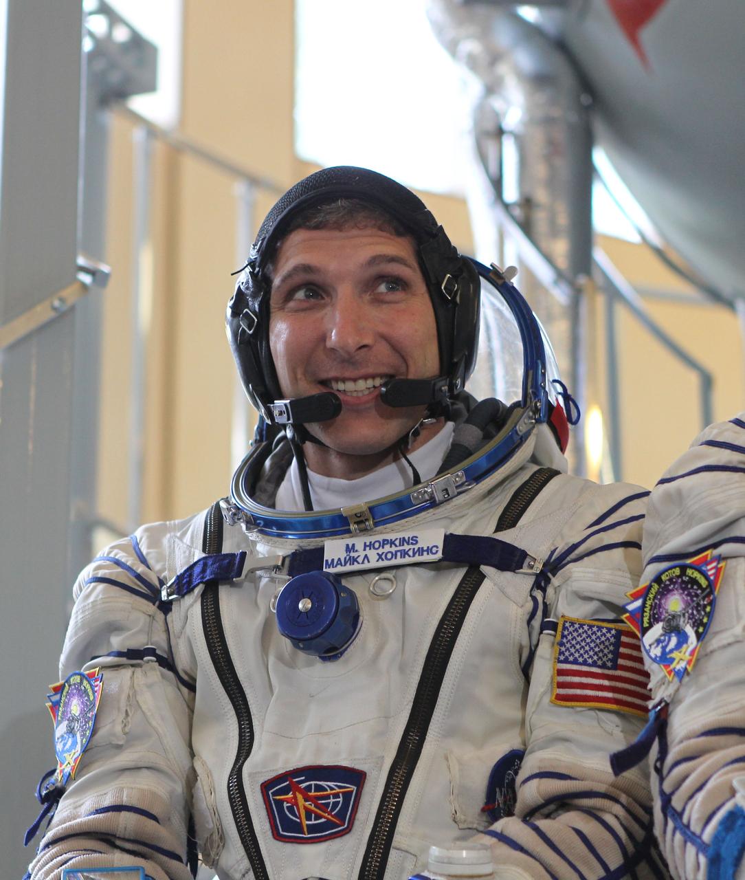 At the Gagarin Cosmonaut Training Center in Star City, Russia, Expedition 37/38 Flight Engineer Michael Hopkins of NASA answers a question from a reporter Sept. 4 as he and his crewmates, Soyuz Commander Oleg Kotov and Flight Engineer Sergey Ryazanskiy conducted a qualification exam. The trio is in final training for launch on Sept. 26, Kazakh time, from the Baikonur Cosmodrome in Kazakhstan on the Soyuz TMA-10M spacecraft for a 5 ½ month mission on the International Space Station. NASA/Stephanie Stoll
