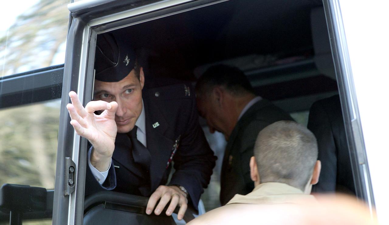 Expedition 37/38 Flight Engineer Michael Hopkins of NASA flashes an “all ok” sign Sept. 13 after boarding a bus at the Gagarin Cosmonaut Training Center in Star City with his crewmates for a ride to nearby airport and a flight to their launch site at the Baikonur Cosmodrome in Kazakhstan. Hopkins, Soyuz Commander Oleg Kotov and Flight Engineer Sergey Ryazanskiy will launch from Baikonur Sept. 26, Kazakh time, in the Soyuz TMA-10M spacecraft for a five and a half month mission on the International Space Station.  NASA/Stephanie Stoll 