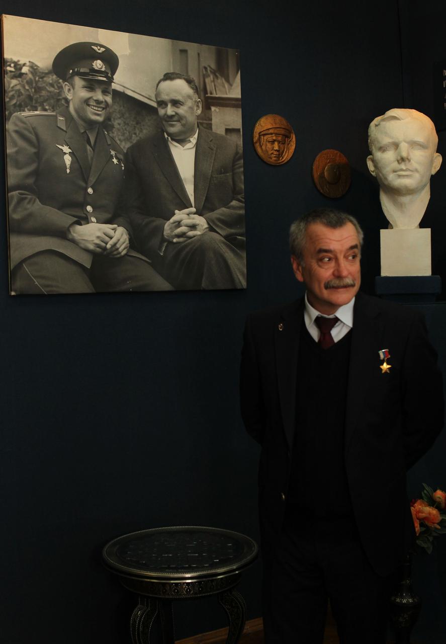 At the Gagarin Museum located at the Gagarin Cosmonaut Training Center in Star City, Russia, Expedition 38/39 Soyuz Commander Mikhail Tyurin poses in front of a statue of Yuri Gagarin, the first human to fly in space, and a picture of Gagarin with Russian space icon Sergei Korolev during a tour October 22, 2013. Tyurin, NASA Flight Engineer Rick Mastracchio and Flight Engineer Koichi Wakata of the Japan Aerospace Exploration Agency will launch Nov. 7, Kazakh time from the Baikonur Cosmodrome in Kazakhstan on the Soyuz TMA-11M spacecraft for the start of a six-month mission on the International Space Station.  NASA/Stephanie Stoll 