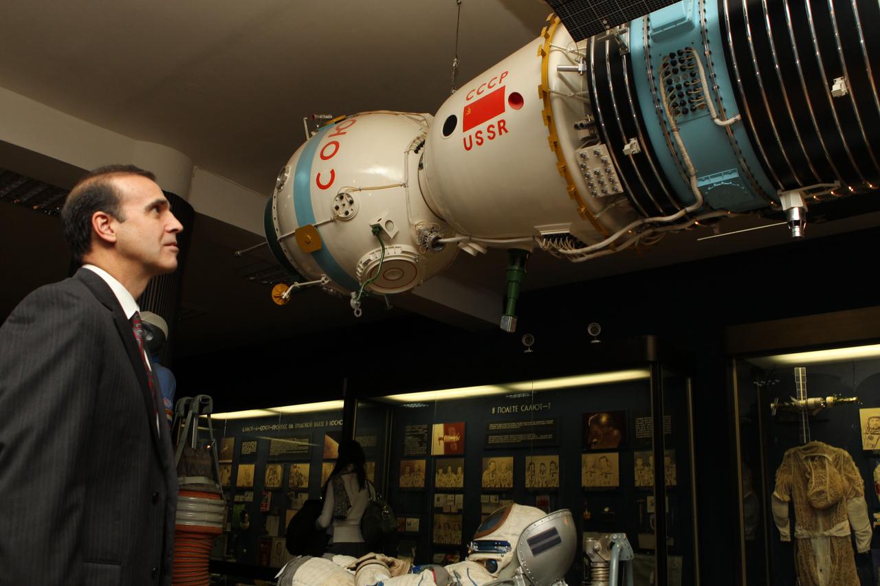 At the Gagarin Museum located at the Gagarin Cosmonaut Training Center in Star City, Russia, Expedition 38/39 Flight Engineer Rick Mastracchio of NASA studies a model of a Soyuz spacecraft during a tour October 22, 2013. Mastracchio, Flight Engineer Koichi Wakata of the Japan Aerospace Exploration Agency and Soyuz Commander Mikhail Tyurin will launch Nov. 7, Kazakh time from the Baikonur Cosmodrome in Kazakhstan on the Soyuz TMA-11M spacecraft for the start of a six-month mission on the International Space Station.  NASA/Stephanie Stoll 