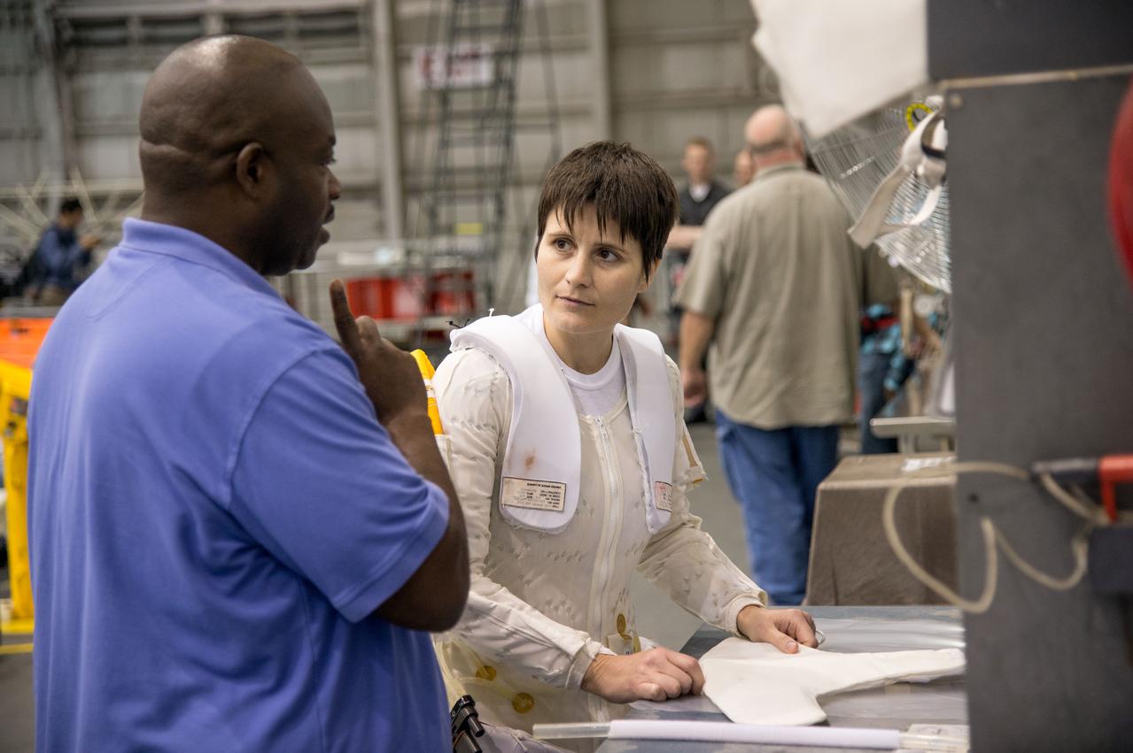 PHOTO DATE:   10-28-13 LOCATION:    NBL - Pool Topside SUBJECT: Expedition 42/43 crew training at the NBL with Scott Kelly and Samantha Cristoforetti during ISS EVA Maintenance 2 PRF. PHOTOGRAPHER:  BILL STAFFORD