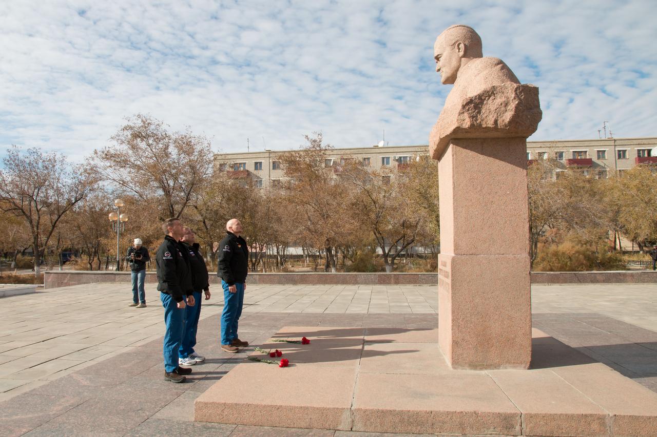 The Expedition 38/39 backup crewmembers lay flowers in front of a statue of Sergei Korolev, the Russian space icon who supervised Yuri Gagarin’s launch in 1961 to become the first human to fly in space, during a tour of the city of Baikonur, Kazakhstan October 27. Alexander Gerst of the European Space Agency (left), Max Suraev (center) and Reid Wiseman of NASA (right) are understudies to the prime crew, Koichi Wakata of the Japan Aerospace Exploration Agency, Soyuz Commander Mikhail Tyurin and Rick Mastracchio of NASA, who will launch Nov. 7, Kazakh time, in the Soyuz TMA-11M spacecraft from Baikonur to begin a six-month mission on the International Space Station. NASA/Victor Zelentsov