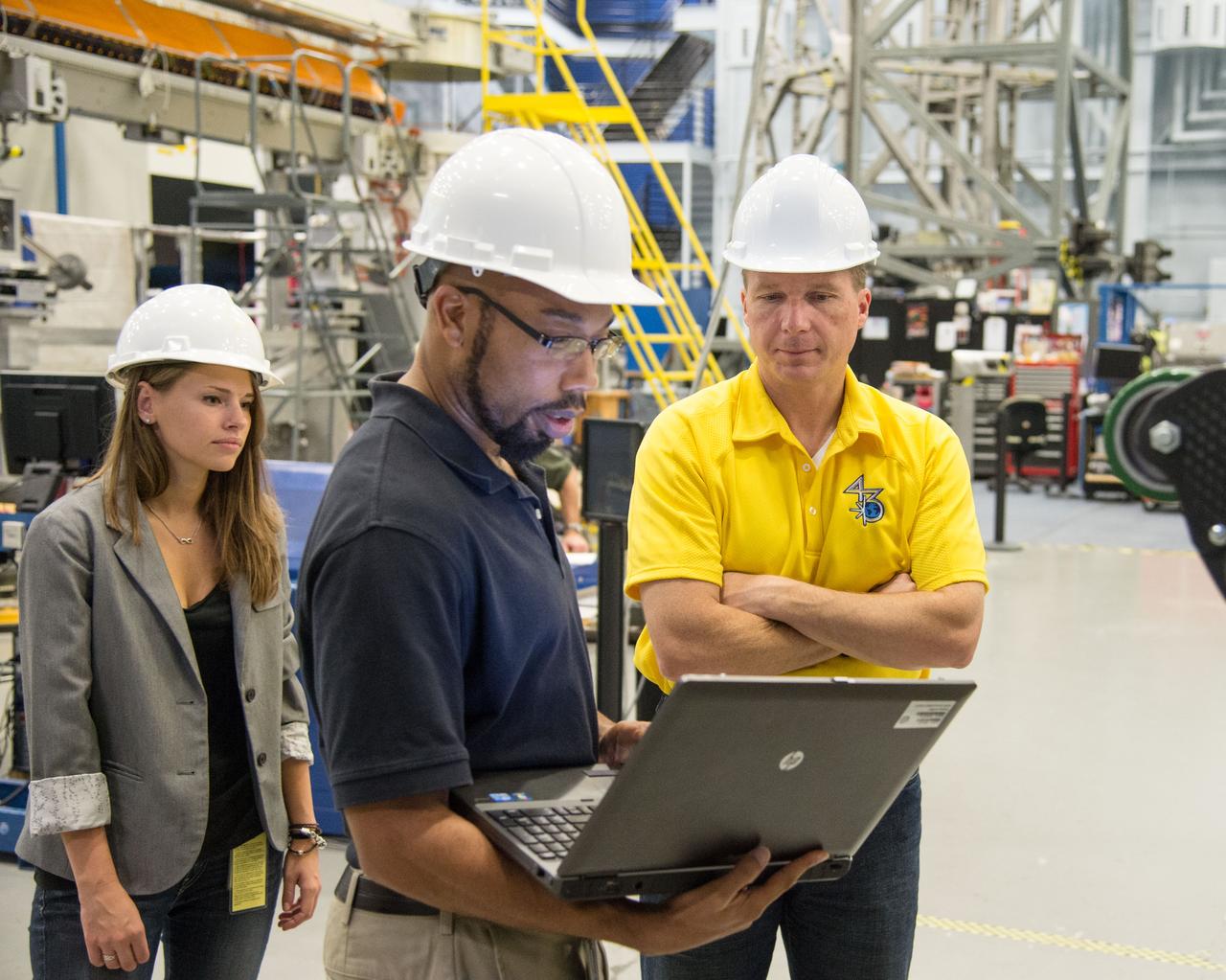  PHOTO DATE:  10-30-13 LOCATION:  Bldg. 9NW - POGO Stand  SUBJECT: Expedition 43 commander and crew member Terry Virts during his ISS EVA POGO 1 training on the POGO stand with instructors Faruq Sabur and Alexandros Kanelakos. PHOTOGRAPHER: BILL STAFFORD