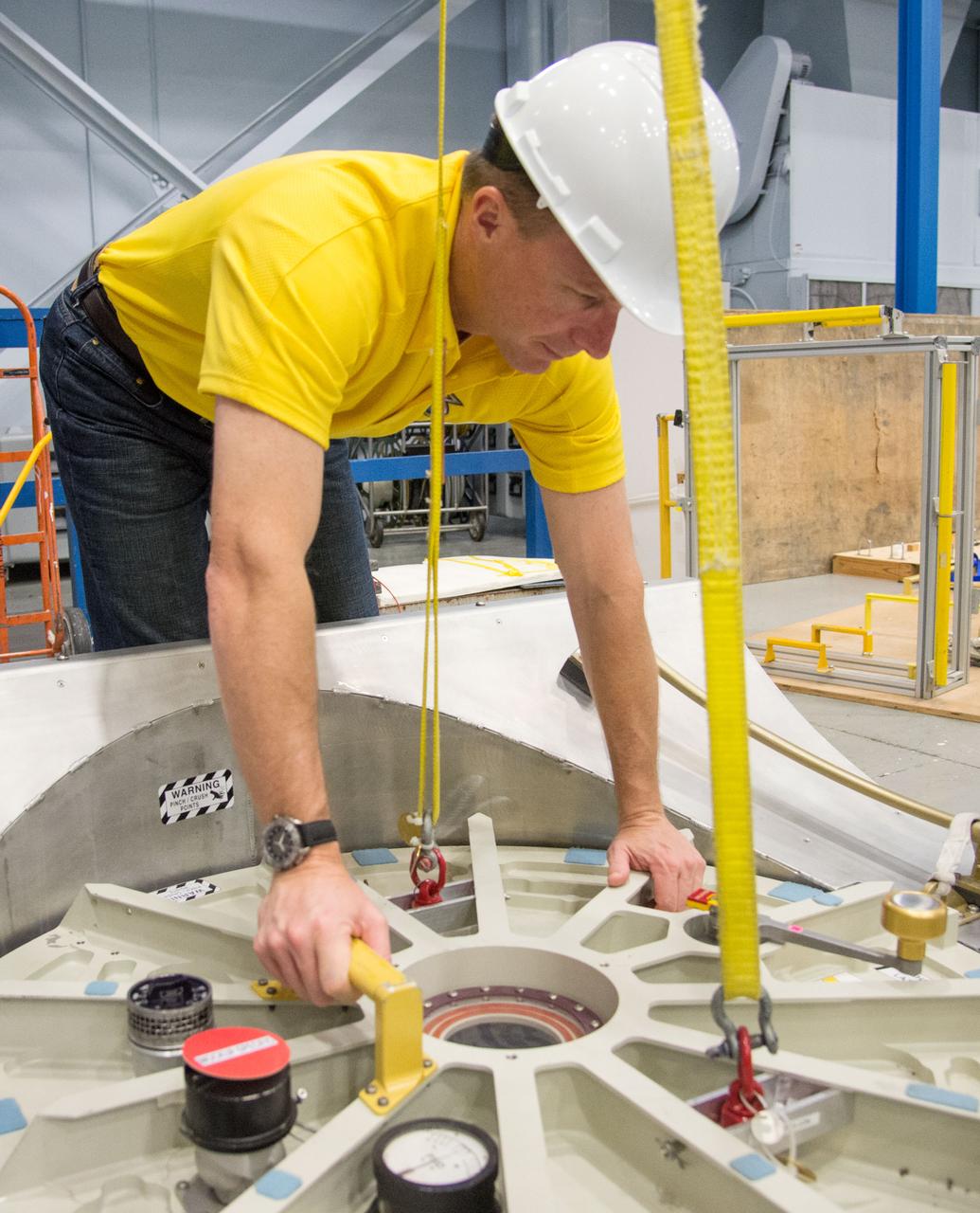  PHOTO DATE:  10-30-13 LOCATION:  Bldg. 9NW - POGO Stand  SUBJECT: Expedition 43 commander and crew member Terry Virts during his ISS EVA POGO 1 training on the POGO stand with instructors Faruq Sabur and Alexandros Kanelakos. PHOTOGRAPHER: BILL STAFFORD