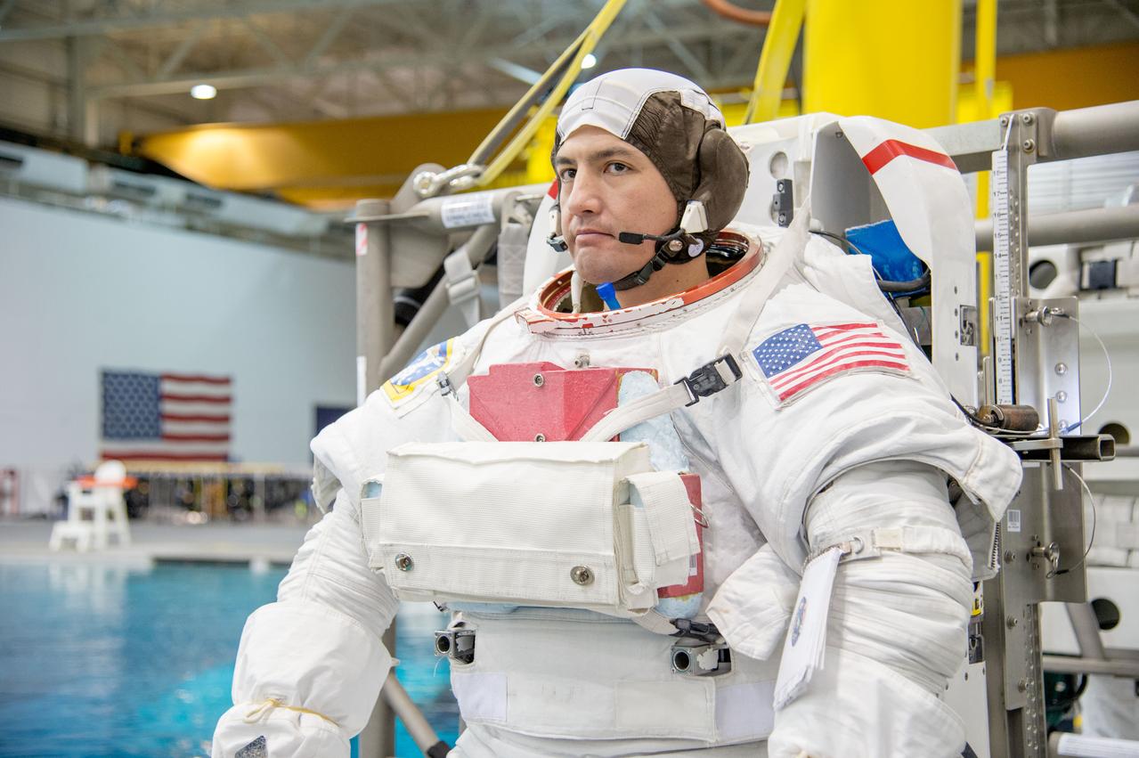 Expedition 44/45 crew training with NASA Astronaut Kjell Lindgren and JAXA Astronaut Kimiya Yui during INC 44 ISS EVA Maintenance 2 with IV Scott Kelly.  Photo Date: December 6, 2013.  Location: NBL - Pool Topside.  Photographer: Robert Markowitz 