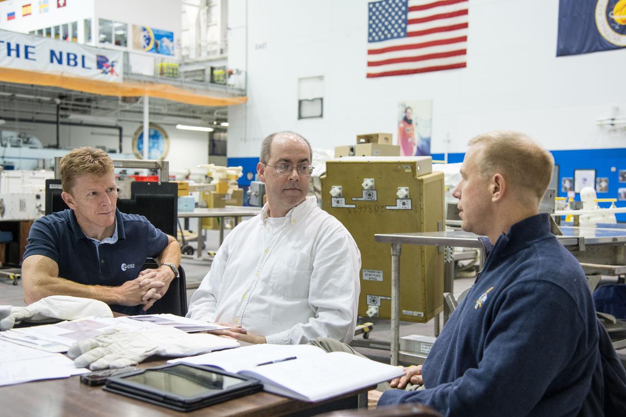 Date: 12/09/13 Location: NBL -  High Bay (MU-S) Subject: Soyuz 45 crew members, Tim Kopra and ESA astronaut Tim Peake during ISS EVA Maintenance 1 - 1G training Photographer: James Blair