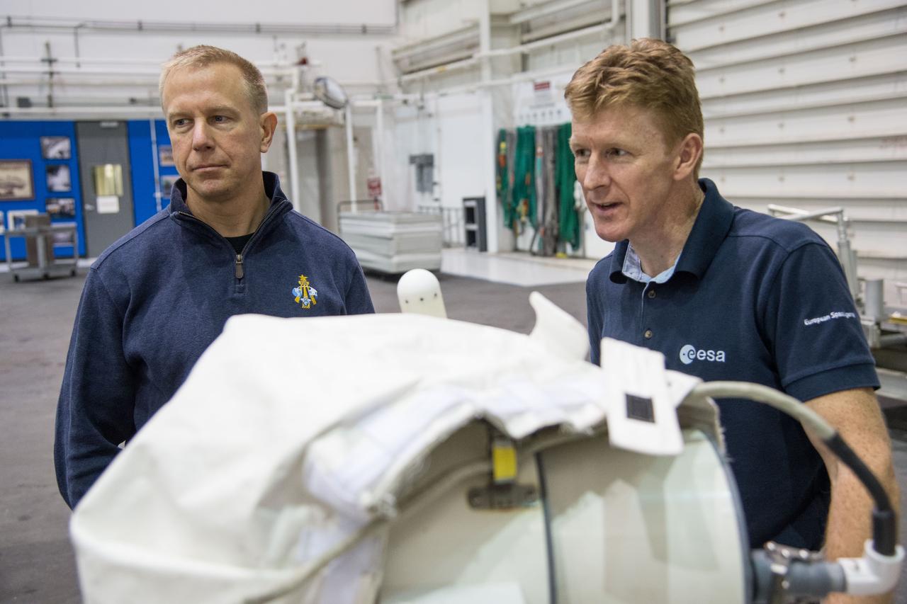 Date: 12/09/13 Location: NBL -  High Bay (MU-S) Subject: Soyuz 45 crew members, Tim Kopra and ESA astronaut Tim Peake during ISS EVA Maintenance 1 - 1G training Photographer: James Blair