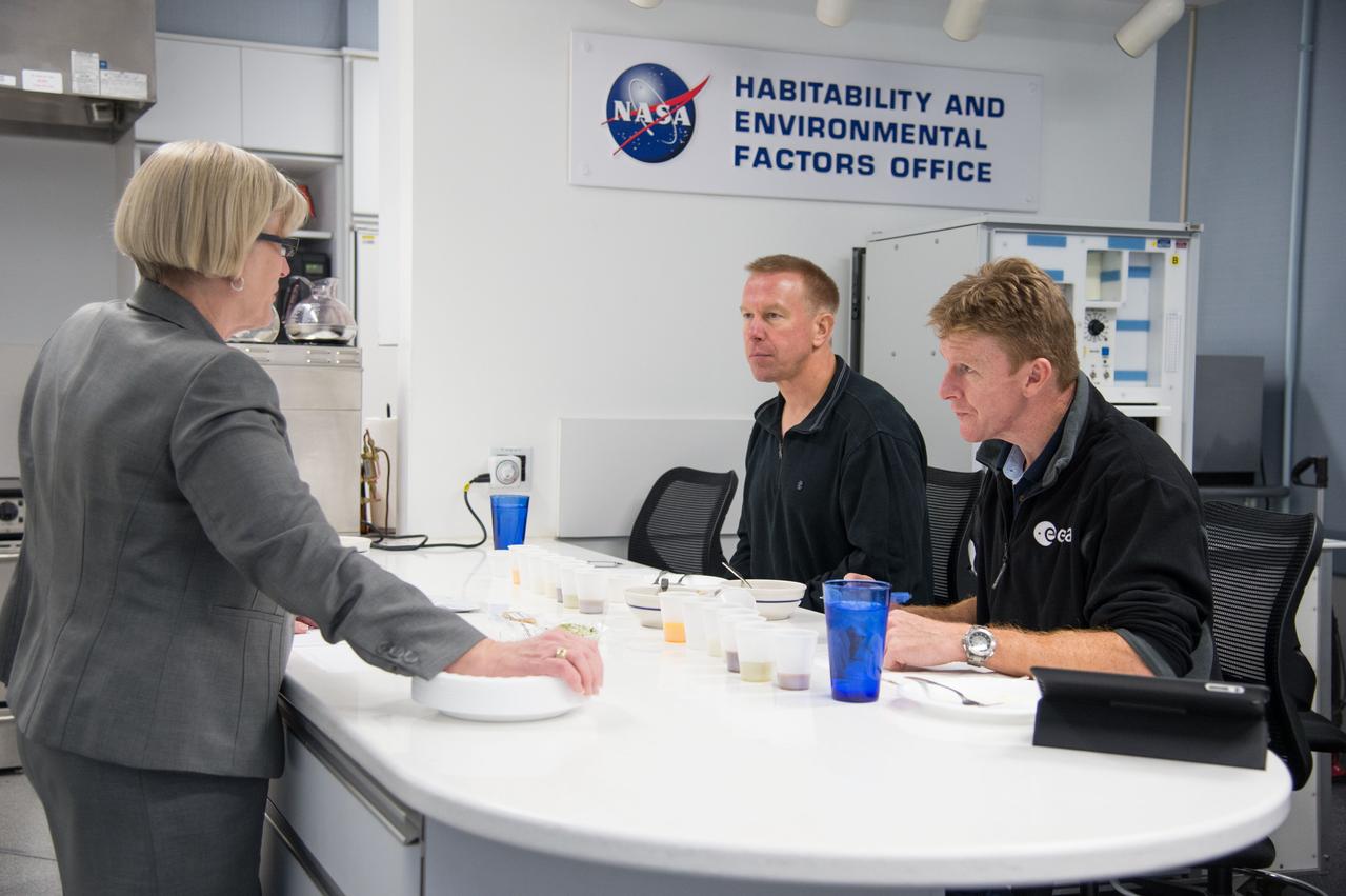  PHOTO DATE: 12-12-13  LOCATION:   Bldg. 17, Rm 1070 - Food Lab SUBJECT:  Soyuz 45 crew members, Tim Kopra and ESA astronaut Tim Peake during food tasting. PHOTOGRAPHER: BILL STAFFORD